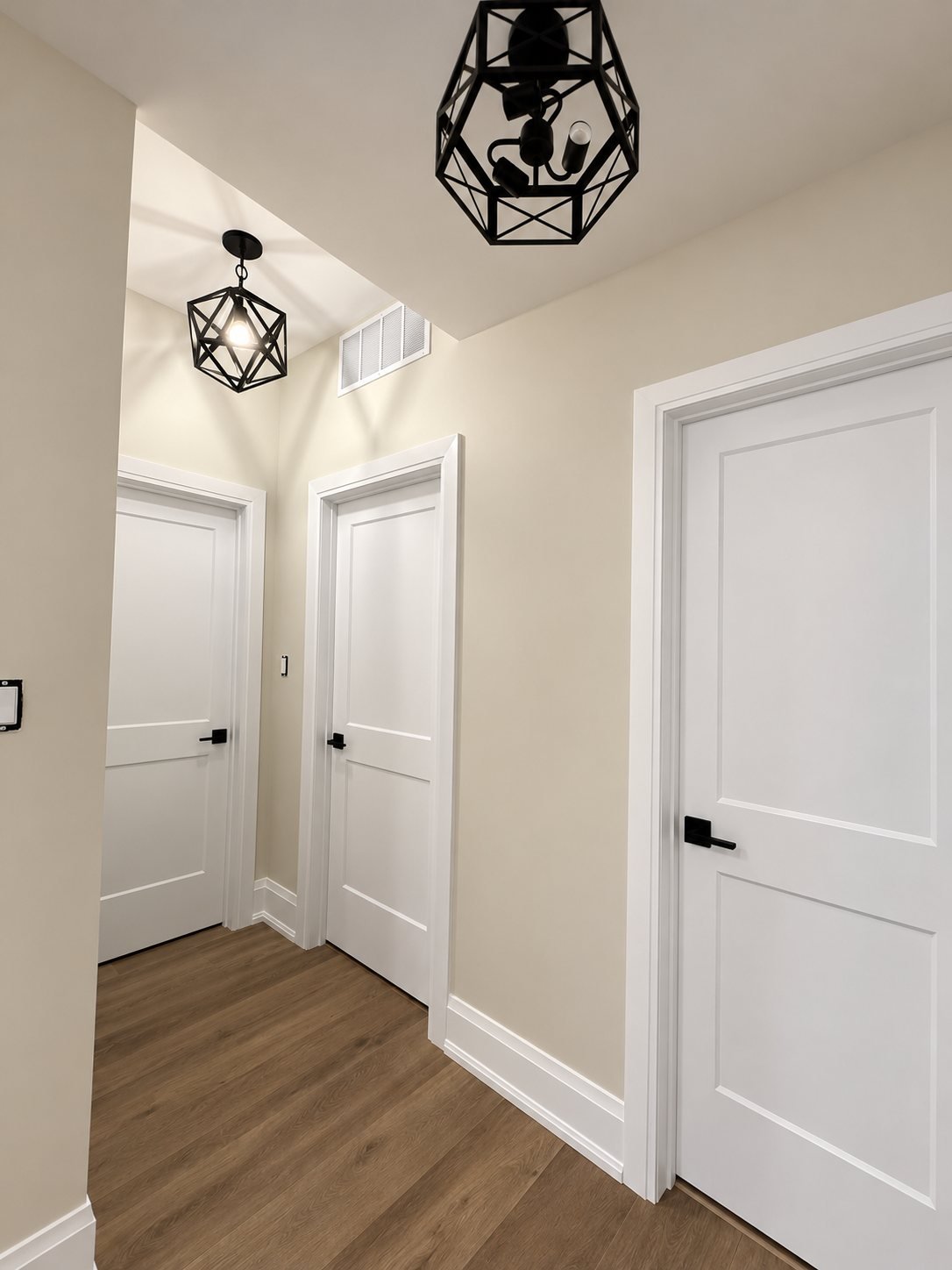 Hallway with freshly painted doors, trim and walls